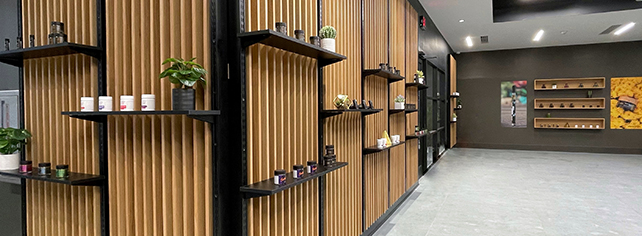 Photo of display shelves on the walls in the Lawrence location